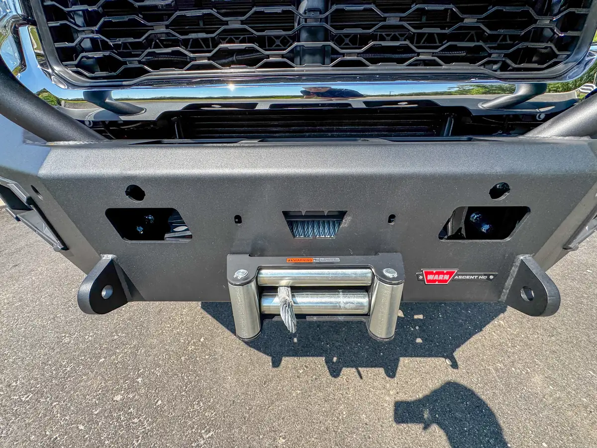 Front bumper control close-up with switch bank and connector ports.